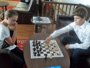 Diana Mirza takes on Magnus Carlson in a skittles game during the King's Tournament, Romania