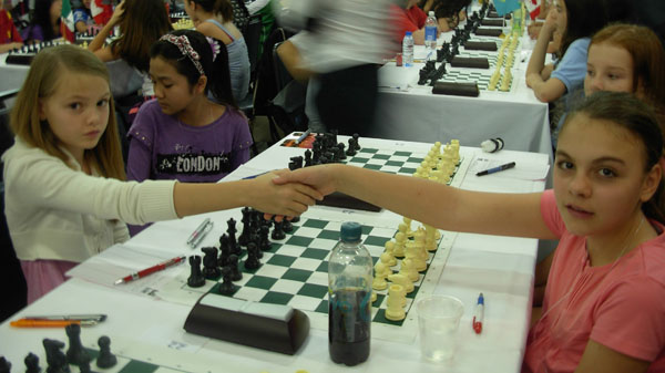 Diana Mirza (right) against Norway in the Word Youth Championships U12 Girls