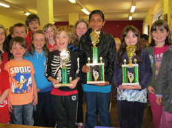 Galway ChessForAll winners: (from left) George Fearnhead (3rd), Alexia Shaju (1st) and Ellen Murray (2nd)