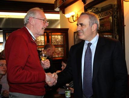 Garry Kasparov speaks with Denis Dempsey