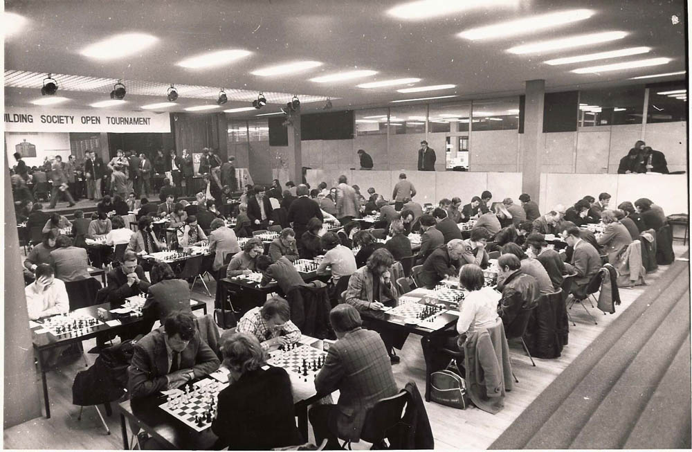 Dundrum International. Tom Collins is 3rd on the right in the white shirt, John Maher is to his right. Tony Miles is at the bottom of the picture, facing away and wearing a dark jacket.