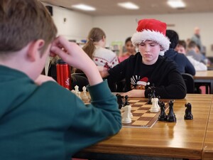 Luke Montgomery (Blasphemous Bishops) in deep concentration at 'Festival of Chess 2025' at Mayfield Library